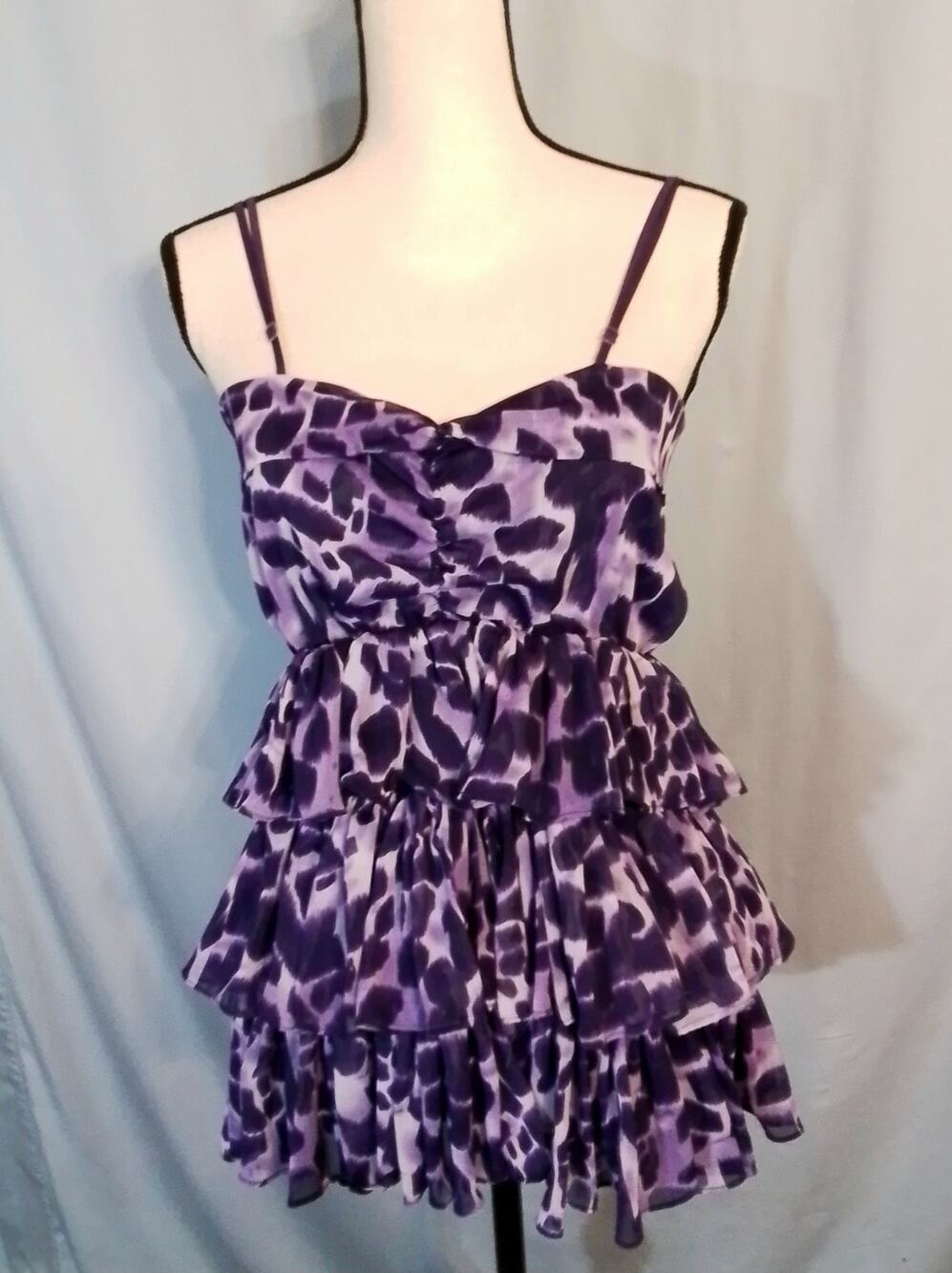 Spangle purple ruffel strappy top.